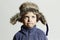 Funny child in fur Hat.fashion casual winter style.little boy