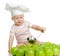 Funny child with green apples healthy food