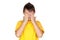 Funny child with yellow t-shirt covering eyes