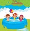 Funny children bathing in the outdoor pool