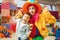 Funny clown, entertainment show with little boys