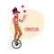 Funny clown juggling balls while riding unicycle, one wheeled bicycle