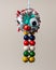Funny colorful abstract animal made of wool and beads by a child