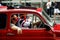 Funny couple in a Fiat 500 classic car