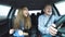 Funny couple singing, dancing, taking selfie, suddenly slowing to avoid accident