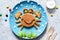 Funny crab on a plate. Pancake crab, children`s breakfast. Lunch to school