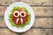 Funny creative halloween food monster green spaghetti pasta with fake blood tomato sauce