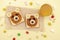 Funny cute bear faces sandwich toast bread with peanut butter, banana,nuts, juice,marshmallow. Kids childrens baby`s sweet desser