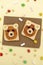 Funny cute bear faces sandwich toast bread with peanut butter, banana,nuts, marshmallow. Kids childrens baby`s sweet dessert