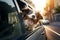 Funny cute dog peeking from car window while on the road. Puppy sitting in car ready for a vacation trip. Travelling with pets