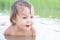 Funny cute girl portrait swimming