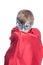 Funny cute little child pretending to be a superhero hiding in his cape