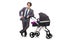 Funny dad with baby and pram on white