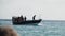 Funny Dancing African Fishermen on Wooden Motor Boat Floating by Ocean, Africa