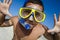 Funny diving man in a swimming mask and snorkel