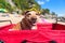 Funny dog with goggles at beach