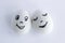 Funny eggs imitating a happy couple of smiling lovers