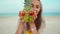 funny emotional portrait laughing woman on beach holding fruit pineapple in red sunglasses