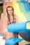 Funny excited child enjoying summer vacation in water park