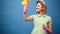 Funny excited housekeeper. Pinup woman in uniform hold soup bottle, duster with clean spray, duster. Cleaning, retro