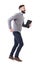 Funny excited young smart casual business man running with notebook in hands.