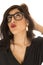 Funny expression woman puckered lips wearing geek glasses