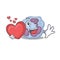 Funny Face leukocyte cell cartoon character holding a heart