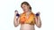 Funny fat woman training with dumbbells.