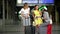 Funny Female Friends are Waiting Together for a Plane at the Airport. Portrait of Three Laughing Women with Travel Bags