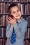 Funny first-grader boy with red apple
