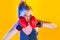 Funny fitness woman with boxing gloves