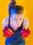 Funny fitness woman with boxing gloves