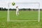 Funny football keeper stops kick into goal at high jump