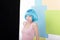 Funny Girl in Fancy Blue Wig and Pink Singlet