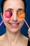 Funny girl with two cakepops