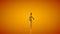 Funny golden mannequin doing a salsa pirouette, seamless loop, orange studio