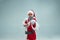 Funny guy in christmas hat. New Year Holiday. Christmas, x-mas, winter, gifts concept.