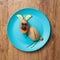 Funny hare made of potatoes on plate