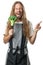 Funny hippie man holding broccoli on a fork