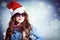Funny hipster girl in sunglasses wearing xmas