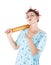 Funny housewife with rolling pin sending kiss