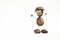 Funny human shape character or figurine made with chestnuts in white isolated background