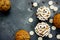 Funny idea for Halloween dessert - cute mummy cupcakes on a gray