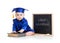 Funny kid in academician clothes at chalkboard