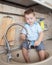 Funny kid boy washing dish on kitchen