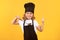 Funny kid chef cook with kitchen ladle, studio portrait. Kid chef cook prepares food on isolated studio background. Kids