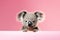 Funny koala isolated on light pink background. Concept of funny animals from zoo or safari. Banner with koala and copy