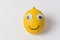 Funny lemon fruit character. Ripe lemon with eyes and smile. creative idea