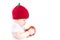 Funny little baby in an apple hat holding a big red apple