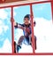 Funny little boy on playground. Cute boy play and climb outdoors on sunny summer day.